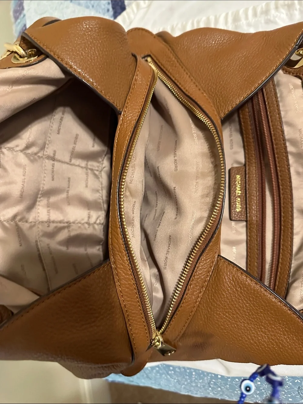 Michael Kors Tan Pebbled Leather Duffel Bag with Gold Hardware